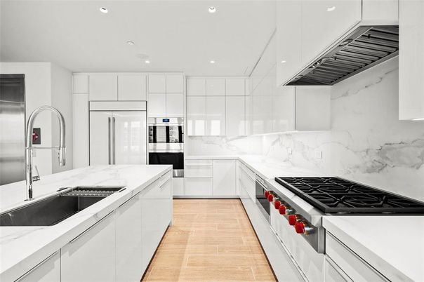 Interior, Kitchen, Marble Walls, Recessed Lighting, Stainless Steel Appliances, Wood Texture Flooring