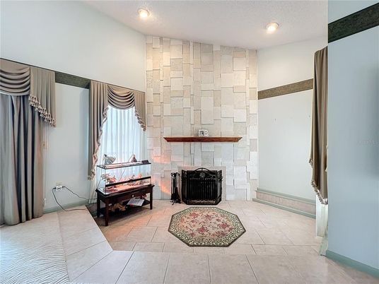 Fireplace, Interior, Piano, Recessed Lighting, Stone Walls