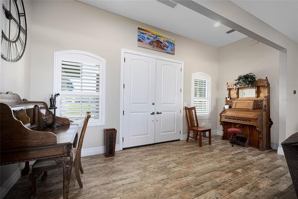 Dining room, Interior, Piano, Recessed Lighting, Wood Texture Flooring