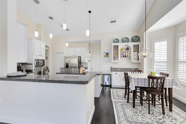 Dining room, Interior, Kitchen, Pendant Lights, Stainless Steel Appliances, Wood Texture Flooring