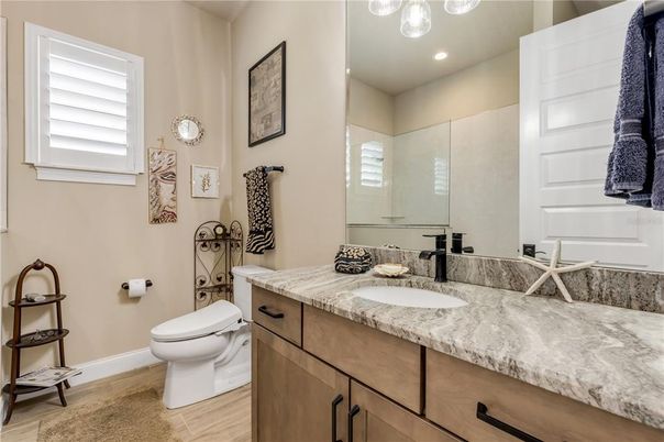 Bathroom, Dual Sink Vanities, Interior, Recessed Lighting, Wood Texture Flooring