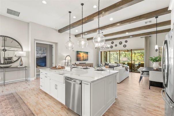 Dining room, Interior, Kitchen, Living room, Pendant Lights, Recessed Lighting, Stainless Steel Appliances, Wooden Beams, Wood Texture Flooring