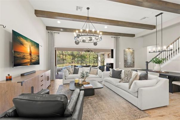 Chandelier, Dining room, Interior, Living room, Pendant Lights, Recessed Lighting, Wooden Beams, Wood Texture Flooring