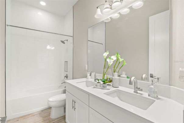 Bathroom, Dual Sink Vanities, Interior, Recessed Lighting, Wood Texture Flooring