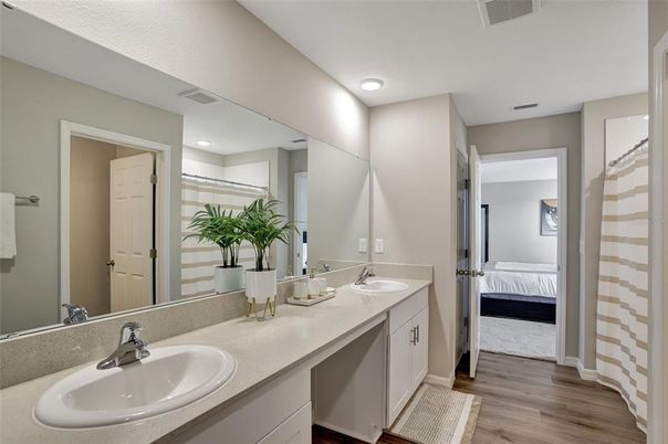 Bathroom, Bedroom, Dual Sink Vanities, Interior, Recessed Lighting, Wood Texture Flooring