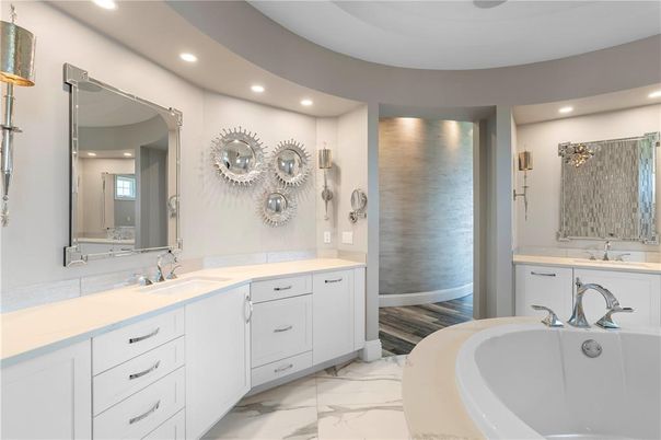 Bathroom, Dual Sink Vanities, Interior, Marble, Recessed Lighting, Wood Texture Flooring