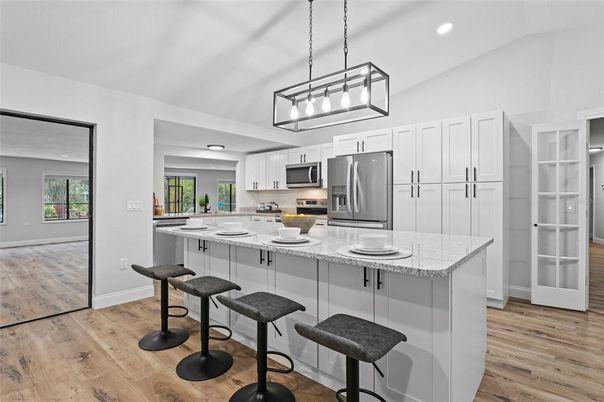 Interior, Kitchen, Pendant Lights, Recessed Lighting, Stainless Steel Appliances, Wood Texture Flooring