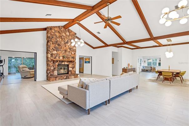 Dining room, Fireplace, Interior, Living room, Pendant Lights, Wooden Beams, Wood Texture Flooring
