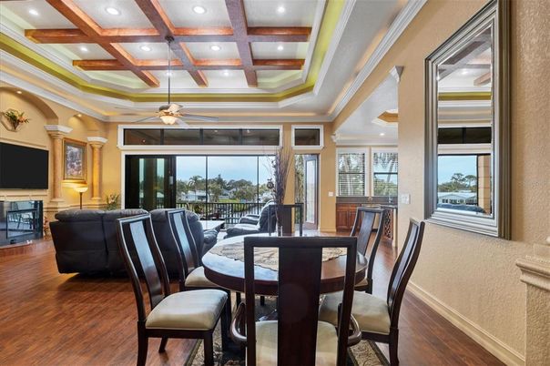 Dining room, Fireplace, Interior, Living room, Recessed Lighting, Wooden Beams, Wood Texture Flooring