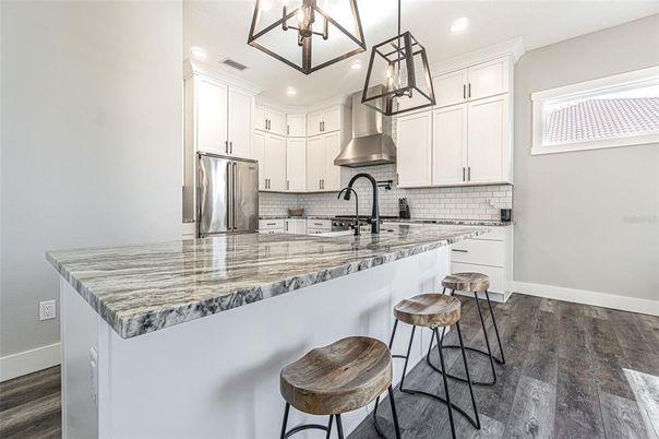 Interior, Kitchen, Pendant Lights, Recessed Lighting, Stainless Steel Appliances, Wood Texture Flooring