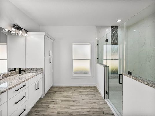 Bathroom, Glass Shower, Interior, Marble Walls, Recessed Lighting, Wood Texture Flooring