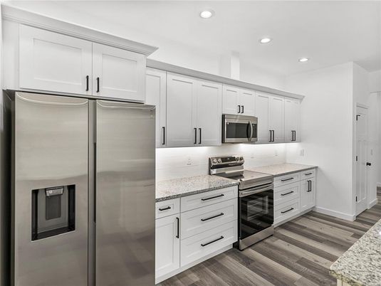 Interior, Kitchen, Recessed Lighting, Stainless Steel Appliances, Wood Texture Flooring