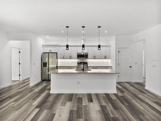 Interior, Kitchen, Pendant Lights, Recessed Lighting, Stainless Steel Appliances, Wood Texture Flooring