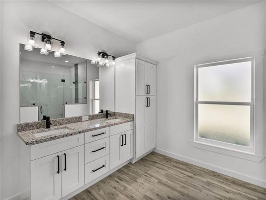 Bathroom, Dual Sink Vanities, Glass Shower, Interior, Wood Texture Flooring