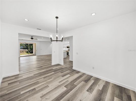 Chandelier, Empty room, Interior, Kitchen, Pendant Lights, Recessed Lighting, Wood Texture Flooring