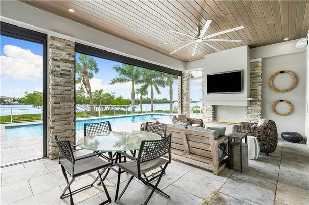 Dining room, Fireplace, Interior, Pool, Recessed Lighting, Water, Wooden Ceilings