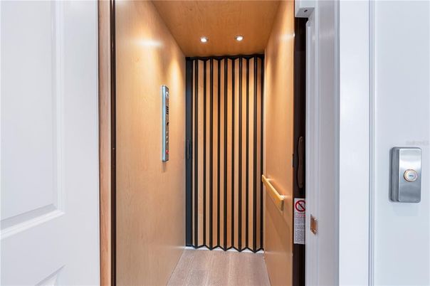 Elevator, Interior, Recessed Lighting, Wooden Ceilings, Wooden Walls