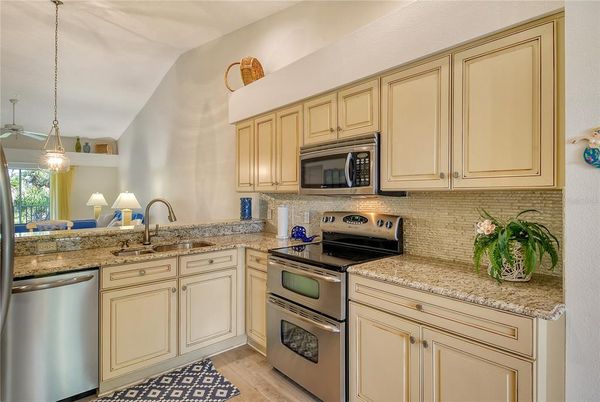 Interior, Kitchen, Pendant Lights, Stainless Steel Appliances, Wood Texture Flooring