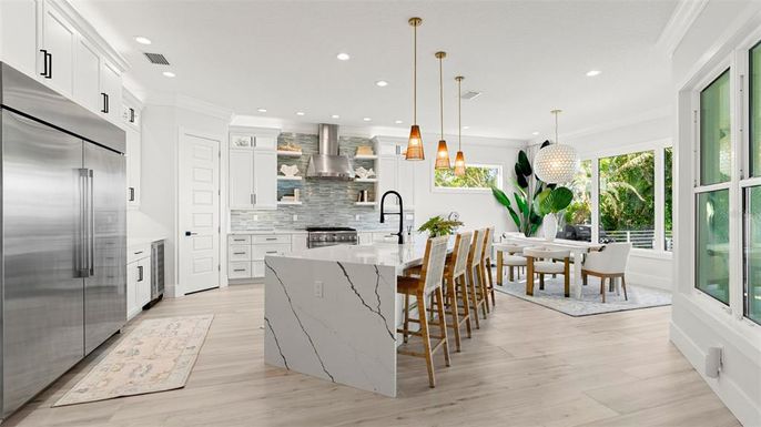 Dining room, Interior, Kitchen, Pendant Lights, Recessed Lighting, Stainless Steel Appliances, Wood Texture Flooring