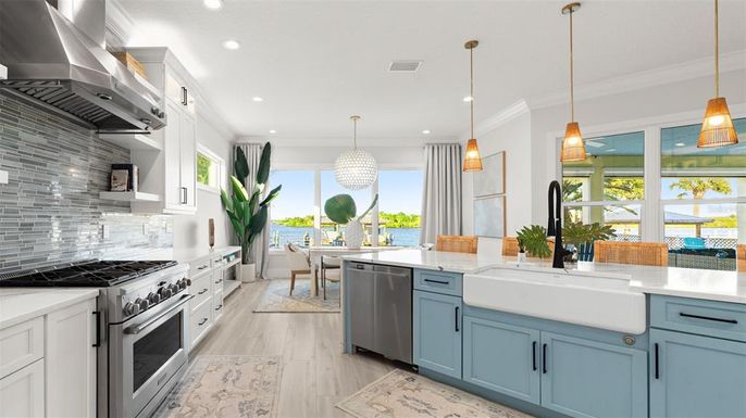 Dining room, Interior, Kitchen, Pendant Lights, Recessed Lighting, Stainless Steel Appliances, Water, Wood Texture Flooring