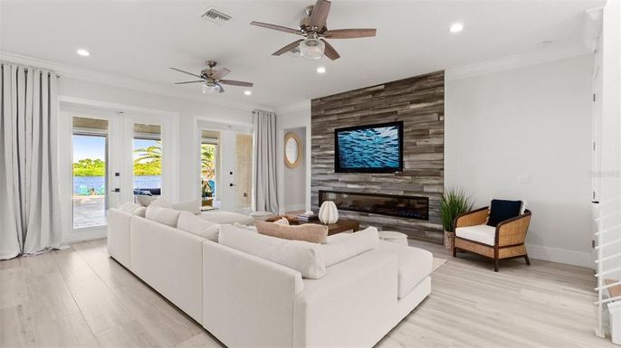 Fireplace, Interior, Living room, Recessed Lighting, Wood Texture Flooring, Wooden Walls