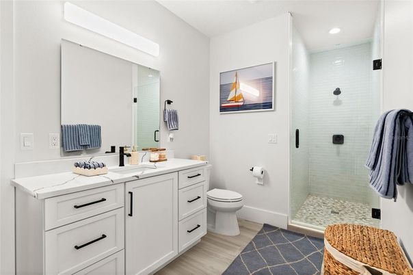 Bathroom, Glass Shower, Interior, Recessed Lighting, Wood Texture Flooring