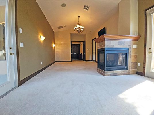 Chandelier, Empty room, Fireplace, Interior