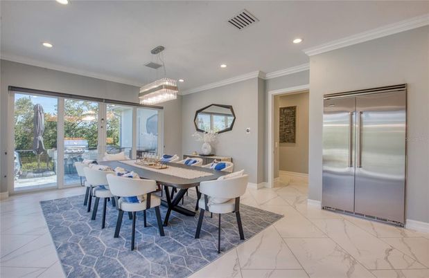 Chandelier, Dining room, Interior, Marble, Pendant Lights, Recessed Lighting, Stainless Steel Appliances