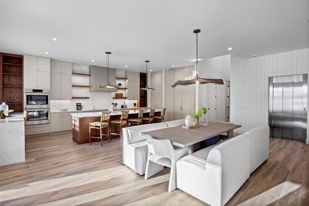 Dining room, Interior, Kitchen, Pendant Lights, Recessed Lighting, Stainless Steel Appliances, Wood Texture Flooring