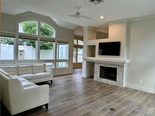 Fireplace, Interior, Living room, Recessed Lighting, Wood Texture Flooring