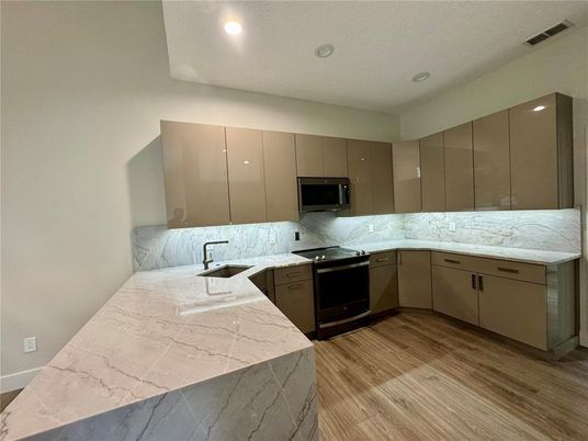 Interior, Kitchen, Marble Walls, Recessed Lighting, Wood Texture Flooring