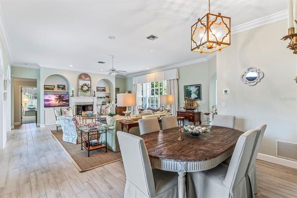 Dining room, Fireplace, Interior, Living room, Pendant Lights, Recessed Lighting, Wood Texture Flooring