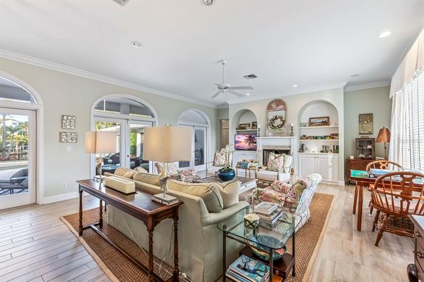 Dining room, Fireplace, Interior, Living room, Recessed Lighting, Wood Texture Flooring