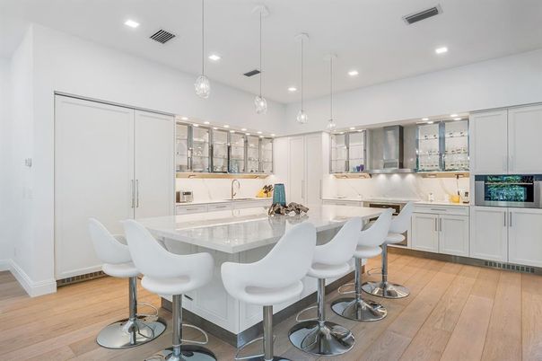 Interior, Kitchen, Marble Walls, Pendant Lights, Recessed Lighting, Stainless Steel Appliances, Wood Texture Flooring