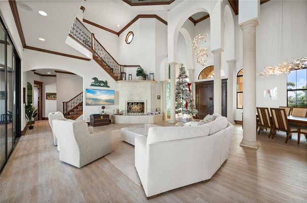Dining room, Fireplace, Interior, Living room, Pendant Lights, Recessed Lighting, Wood Texture Flooring