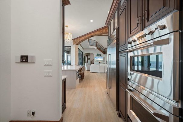 Chandelier, Interior, Kitchen, Recessed Lighting, Stainless Steel Appliances, Wood Texture Flooring