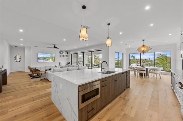 Dining room, Interior, Kitchen, Living room, Pendant Lights, Recessed Lighting, Stainless Steel Appliances, Wood Texture Flooring