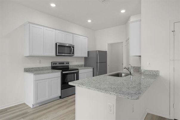 Interior, Kitchen, Recessed Lighting, Stainless Steel Appliances, Wood Texture Flooring