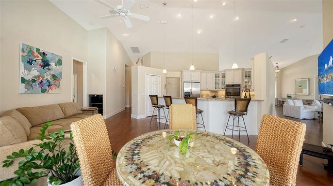 Dining room, Interior, Kitchen, Living room, Pendant Lights, Recessed Lighting, Stainless Steel Appliances, Wood Texture Flooring