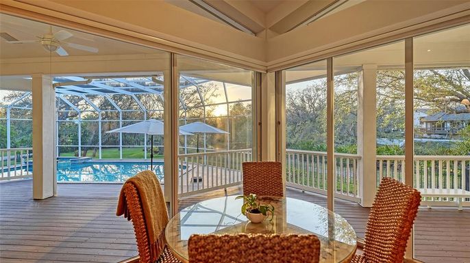 Dining room, Glass Ceilings, Interior, Pool, Sun Room, Wood Texture Flooring