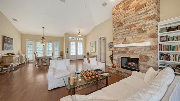 Dining room, Fireplace, Interior, Living room, Pendant Lights, Stone Walls, Wood Texture Flooring