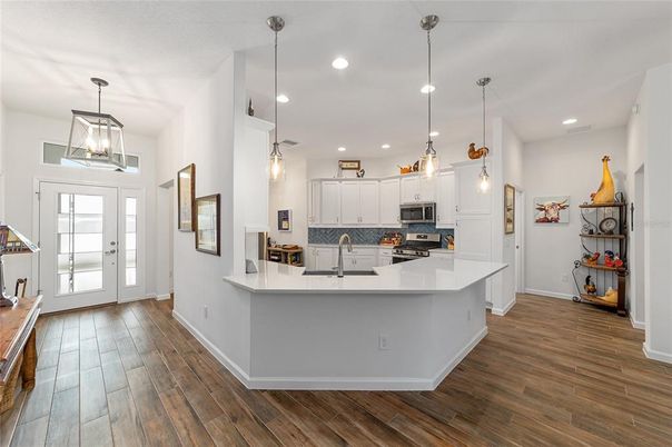 Interior, Kitchen, Pendant Lights, Recessed Lighting, Stainless Steel Appliances, Wood Texture Flooring