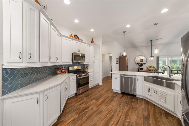 Interior, Kitchen, Pendant Lights, Recessed Lighting, Stainless Steel Appliances, Wood Texture Flooring