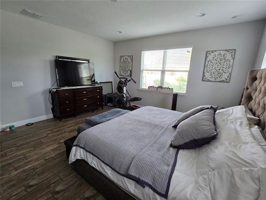 Bedroom, Fitness Equipment, Interior, Recessed Lighting, Wood Texture Flooring