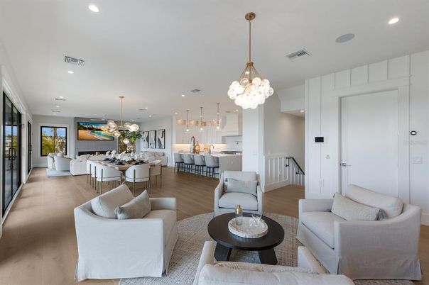 Dining room, Interior, Kitchen, Living room, Pendant Lights, Recessed Lighting, Stainless Steel Appliances, Wood Texture Flooring