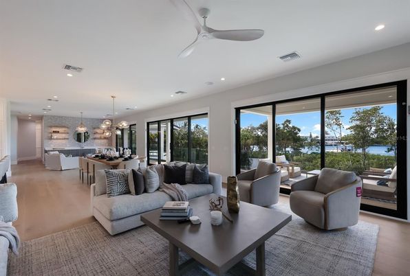 Dining room, Interior, Kitchen, Living room, Pendant Lights, Recessed Lighting, Stainless Steel Appliances, Wood Texture Flooring