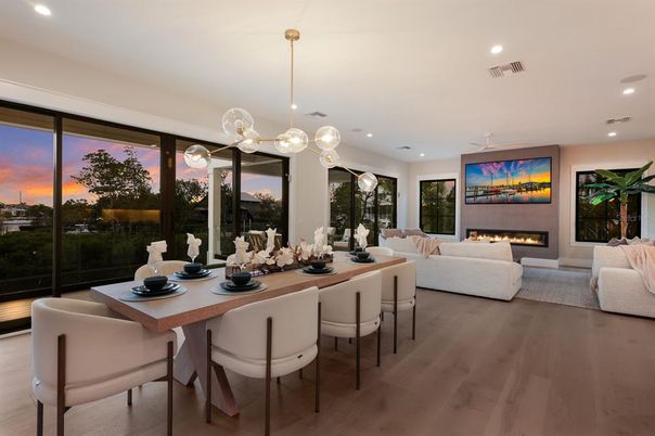 Dining room, Fireplace, Interior, Living room, Pendant Lights, Recessed Lighting, Wood Texture Flooring