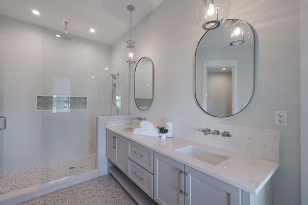 Bathroom, Dual Sink Vanities, Glass Shower, Interior, Pendant Lights, Recessed Lighting