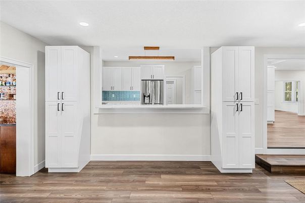Interior, Kitchen, Recessed Lighting, Stainless Steel Appliances, Wood Texture Flooring