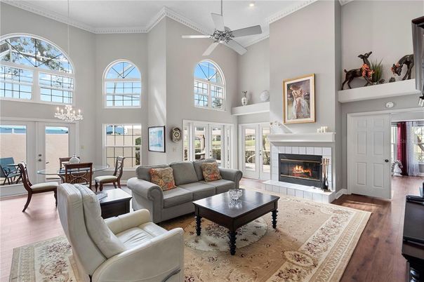 Chandelier, Dining room, Fireplace, Interior, Living room, Piano, Wood Texture Flooring